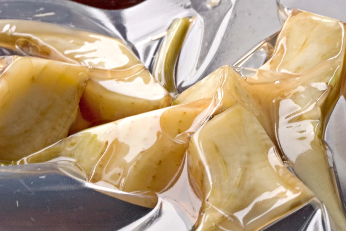 Artichoke pieces poached in olive brine, a chef’s use of the leftover liquid