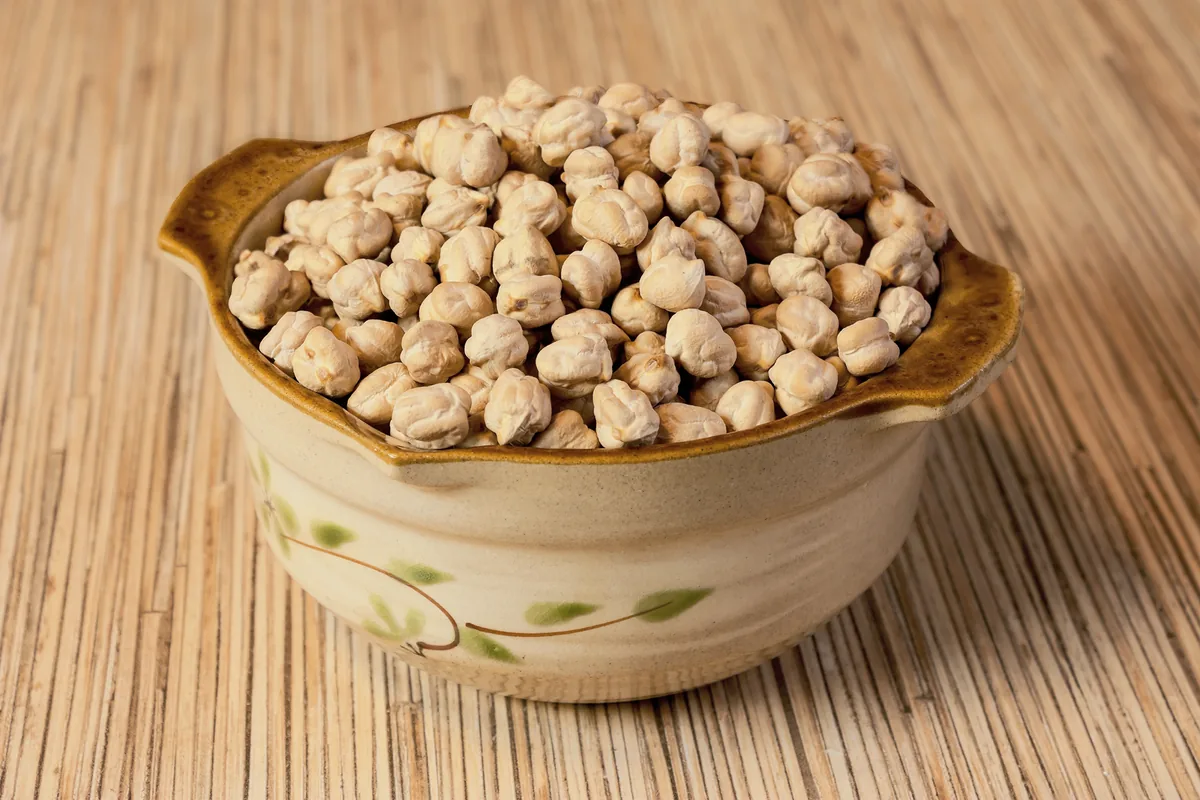 Dried chickpeas in a ceramic bowl