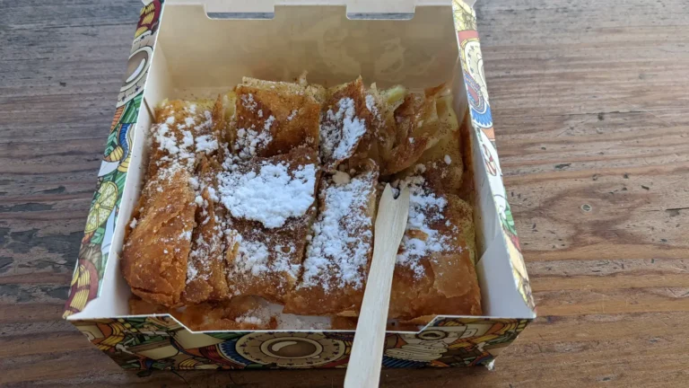A tray of fresh bougatsa dusted with sugar, from a bakery in Kallithea, Athens