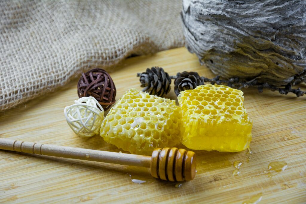 Honeycomb with a wooden dipper