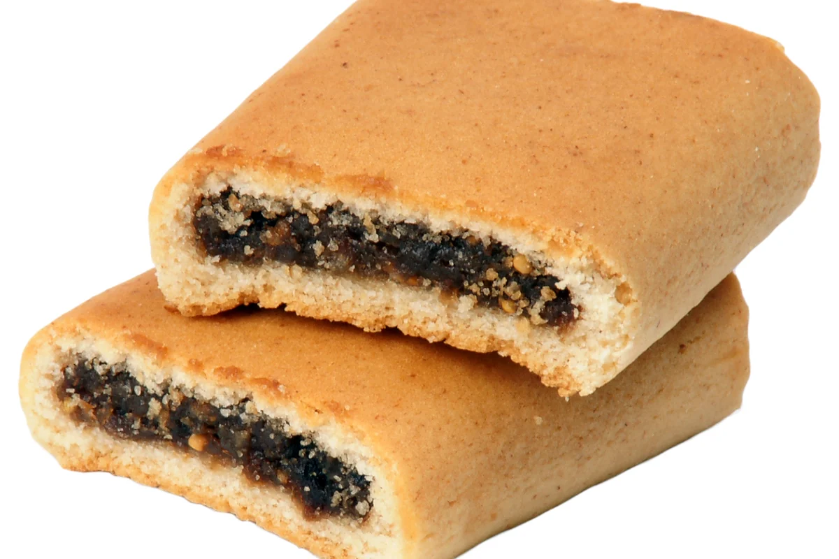 Two stacked fig bar cookies with a soft fig filling