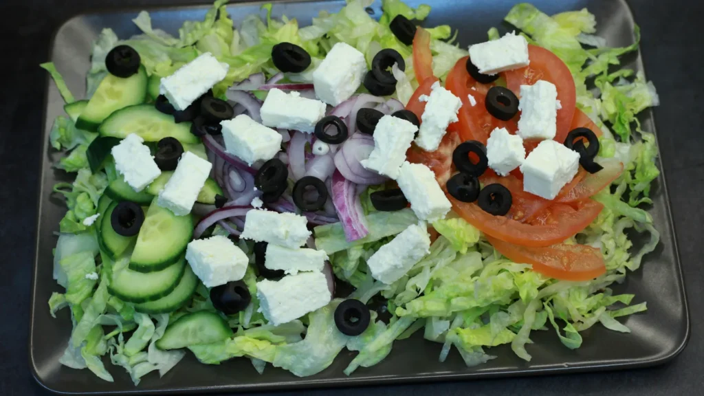 Greek salad with feta, olives and cucumber, one of the easiest Greek oregano cooking ideas