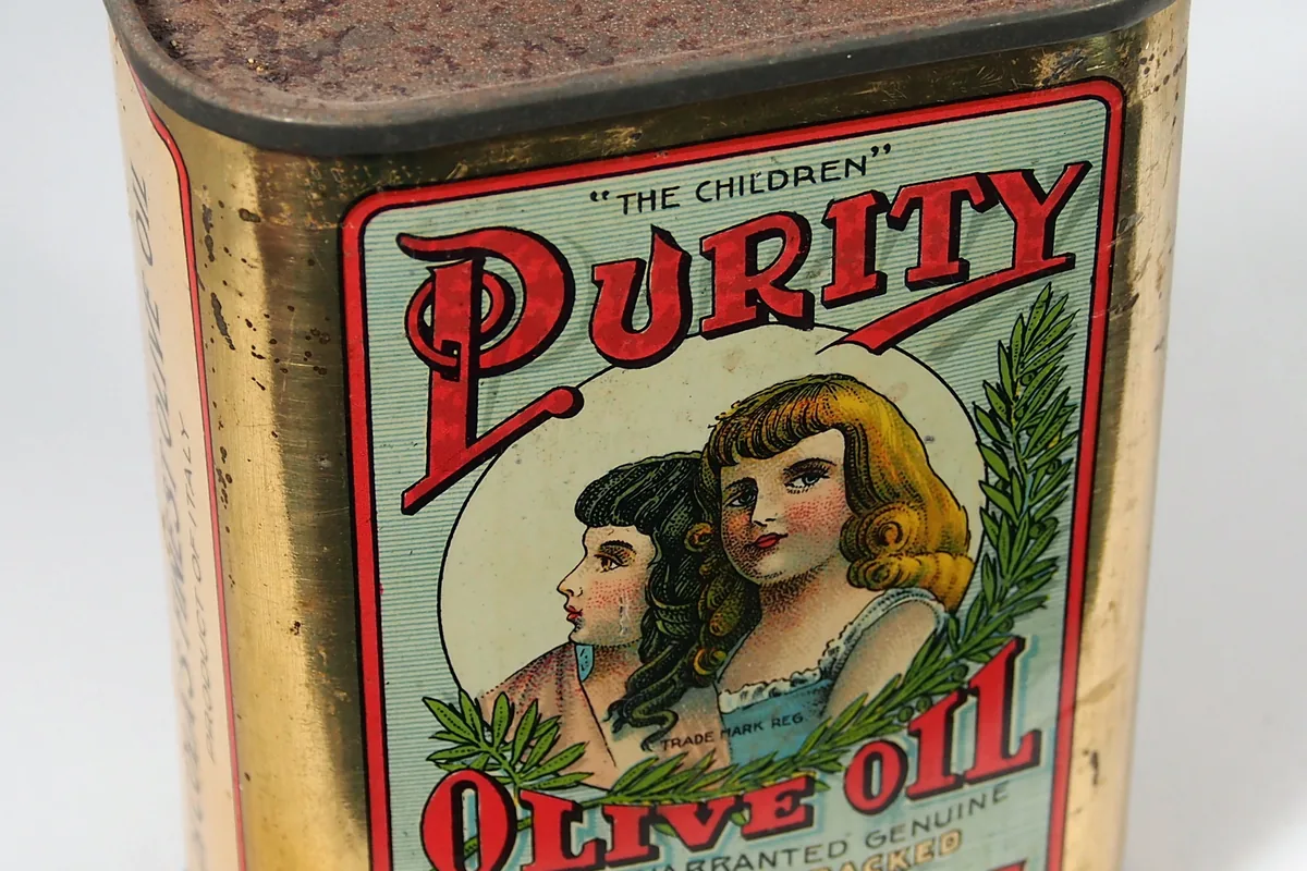 Vintage printed olive oil tin, a classic light-blocking container